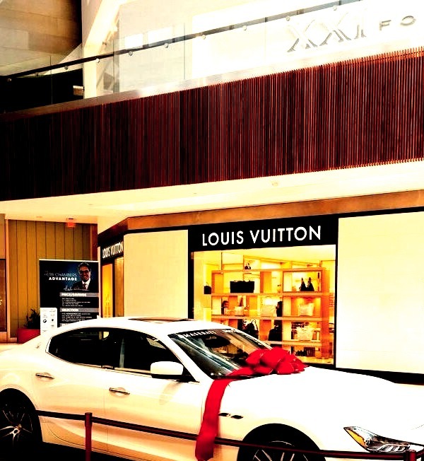 Maserati and a Louis Vuitton storeWww.discoverlavish.com